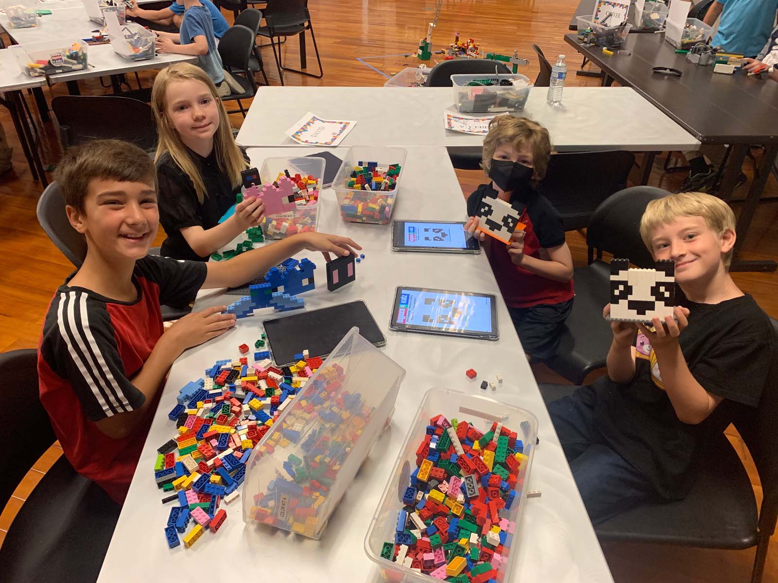 Kids Building with LEGO Bricks at Camp